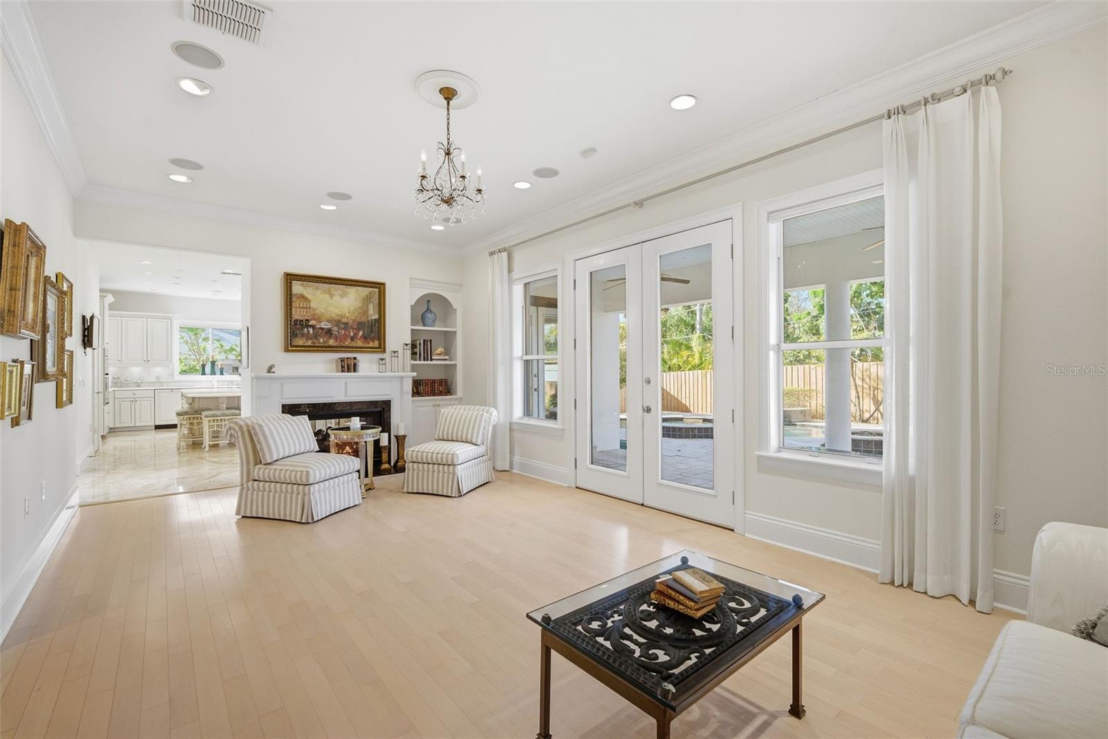 Family room looking to kitchen