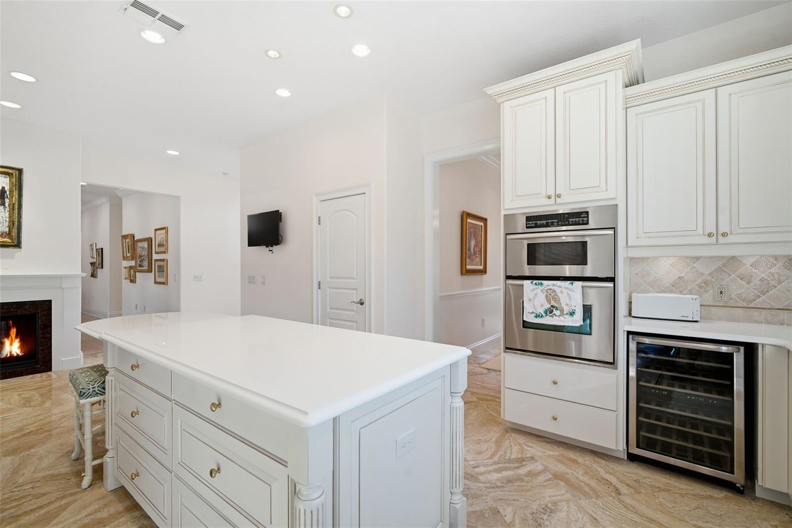 warming drawer, pantry, wine fridge, built-in convection oven and microwave.