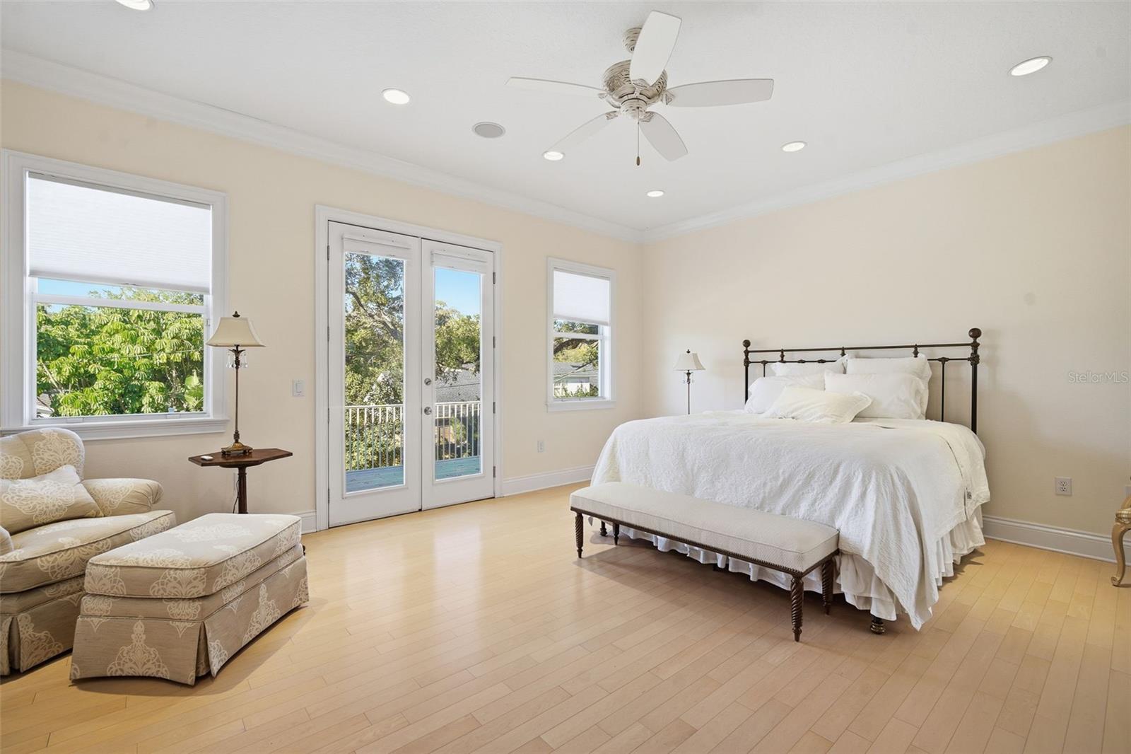 Primary Bedroom looking out the large 27 X 23 balcony,