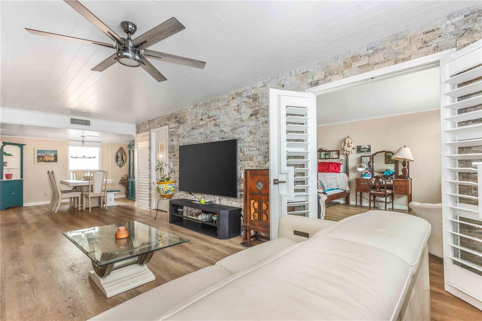 Living Room, 2 entrances to Primary Bdrm, Dining Rm view