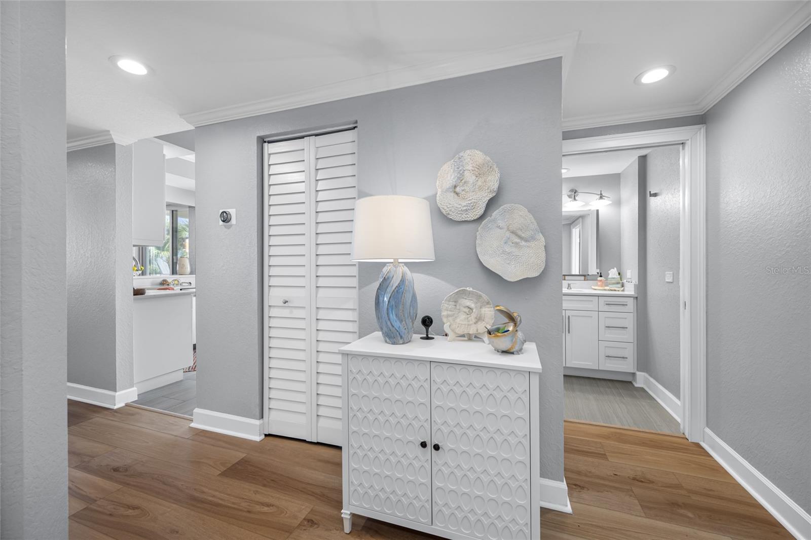 Hallway looking toward kitchen entry and guest bath