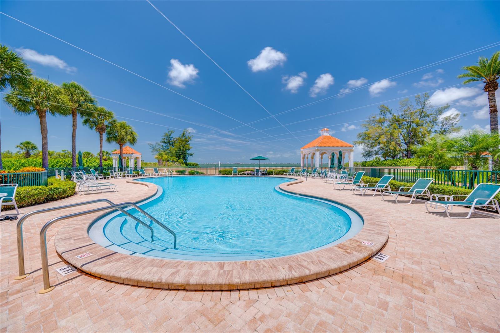 Community pool next to Private Beach