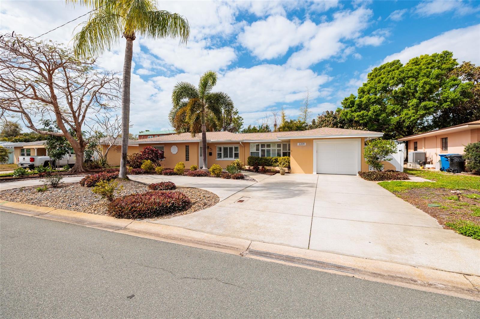 Plenty of parking and a circular drive for your convenience. Also an attached 1 car garage.