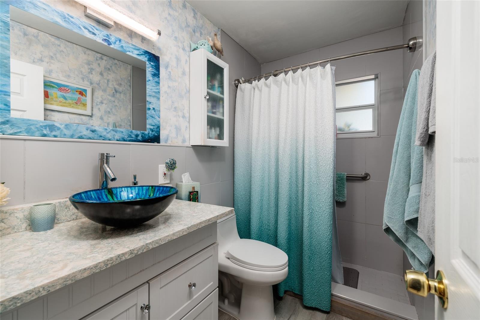 Bathroom w/Shower, Exhaust vent & GFCI outlet.