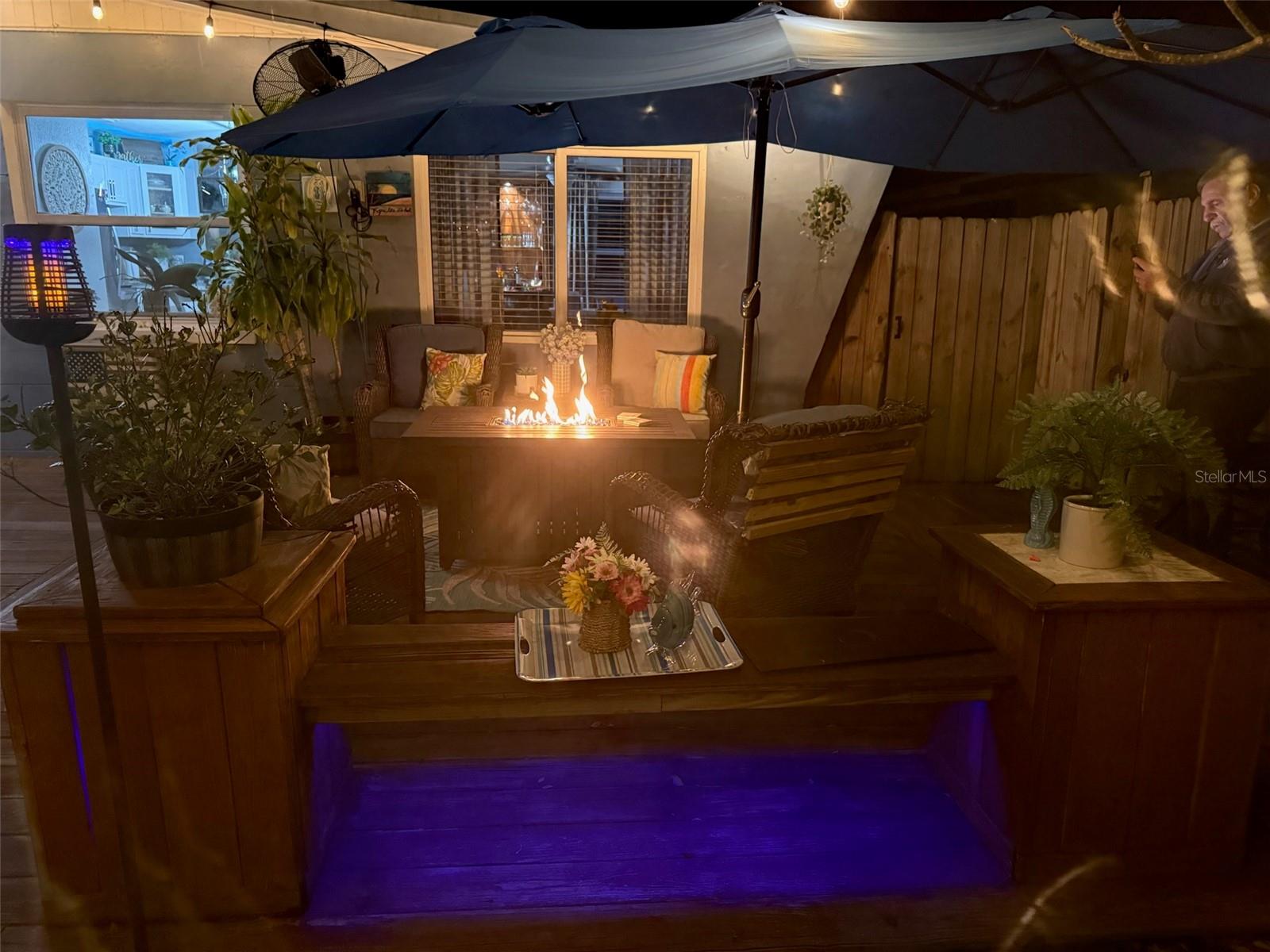 Patio table with gas flames.