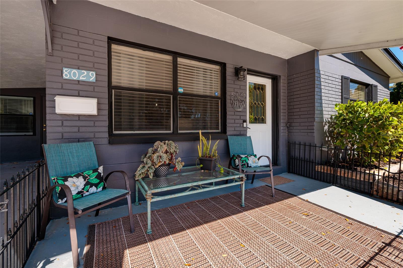 Fenced in Front Porch.