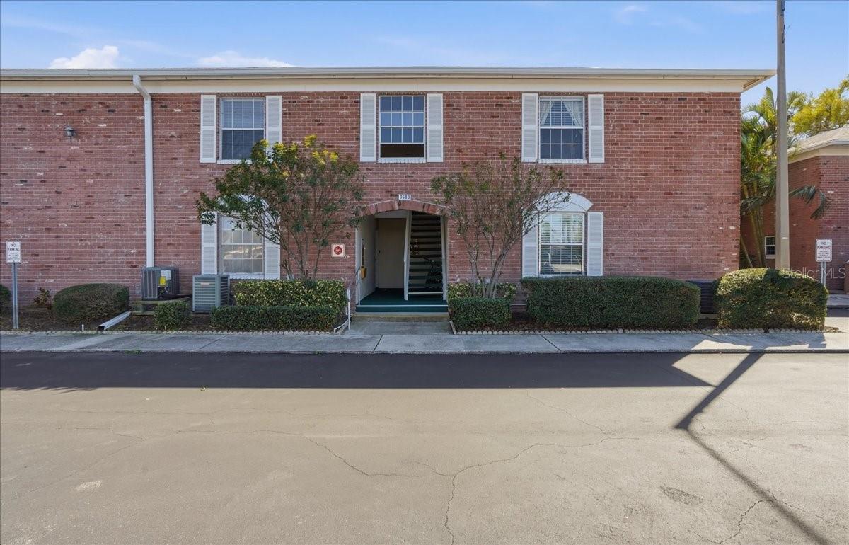 Front entrance of Building 16 with 4 condos. #96 is upstairs to right.