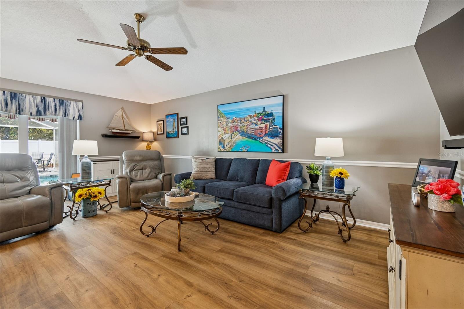 Views of the outdoor pool area from the main living space.