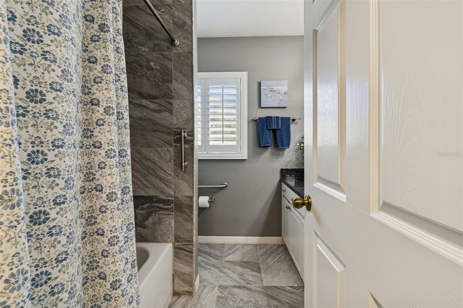 Your recently renovated secondary bathroom.