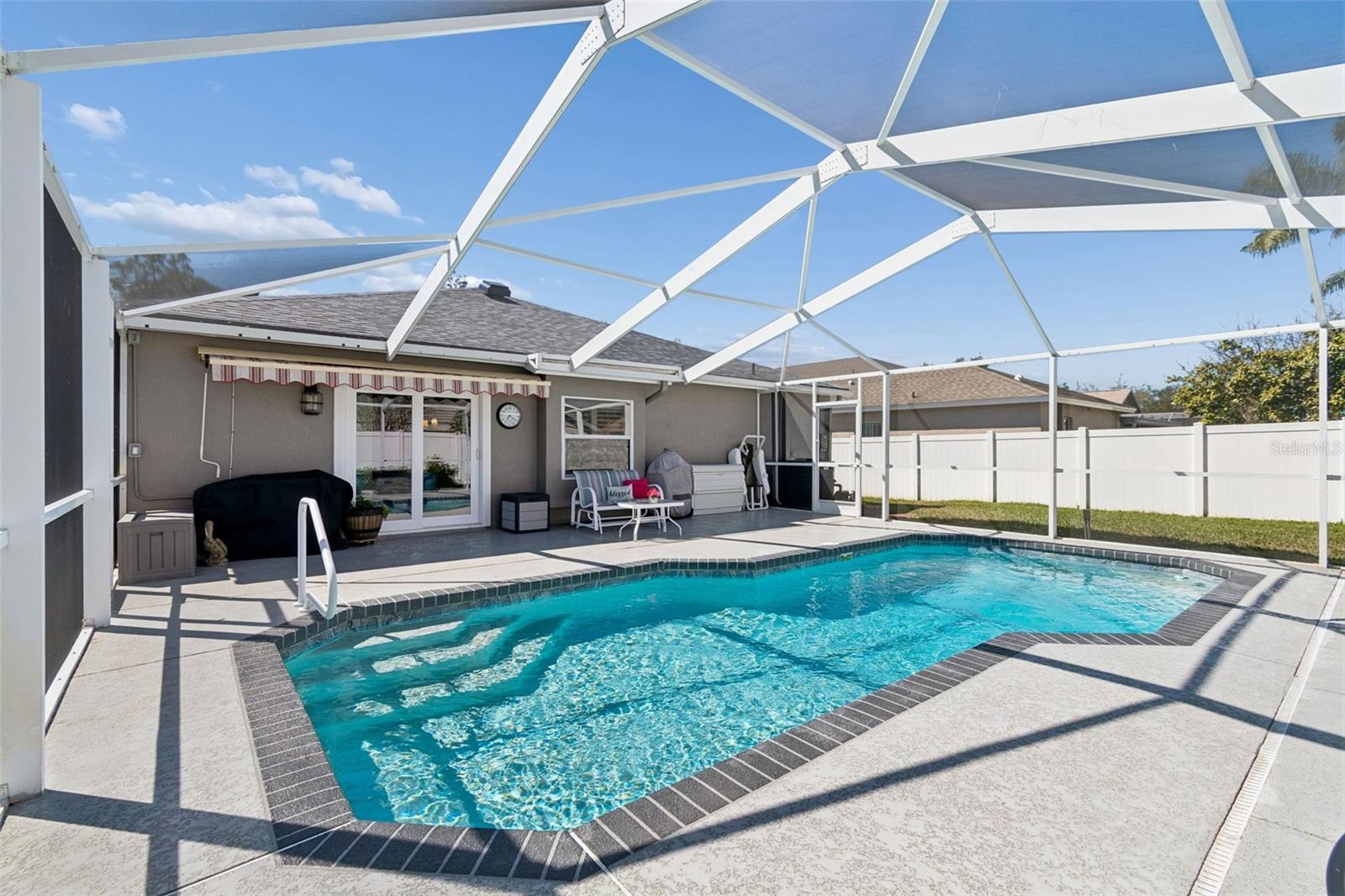 Your home features an expansive outdoor space for your enjoying your salt water pool.