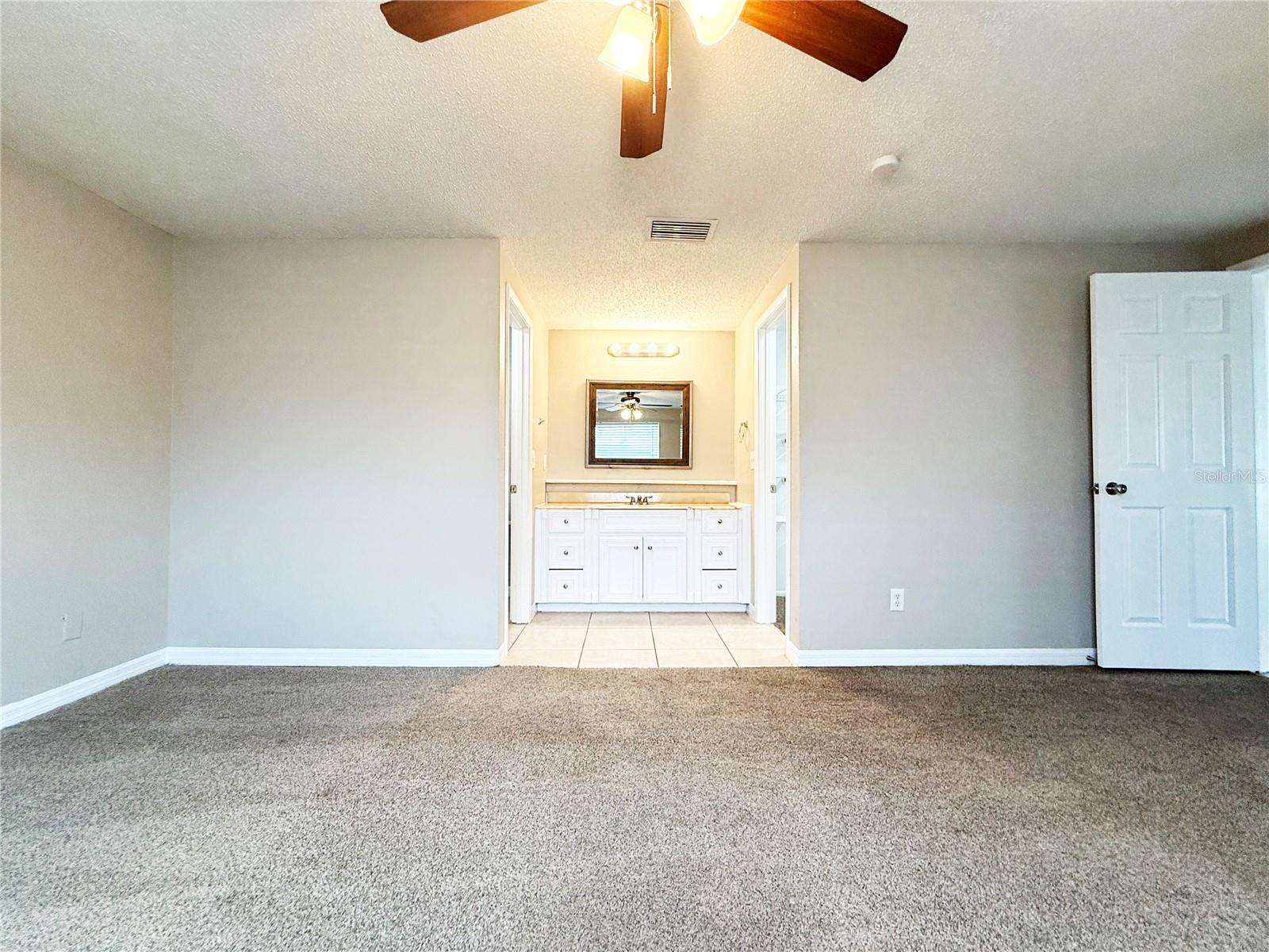 Primary bedroom and ensuite bathroom