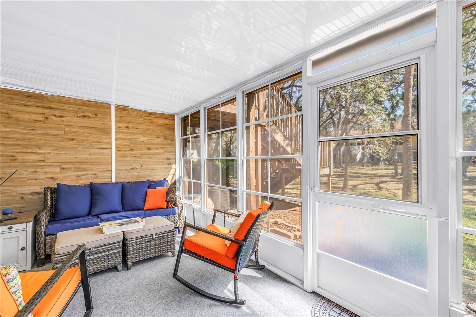 Four season over sized Florida room with park view