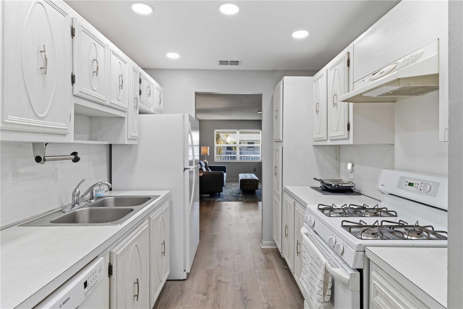 This galley style kitchen has been nicely maintained!