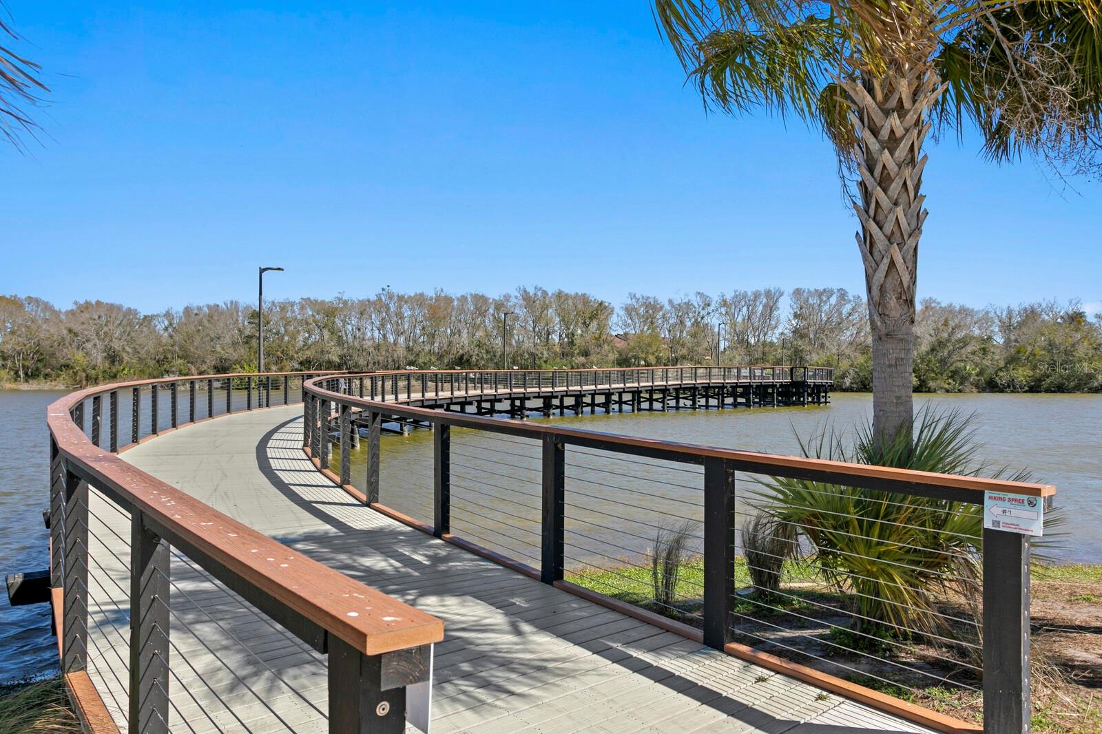 Walk across the bridge.