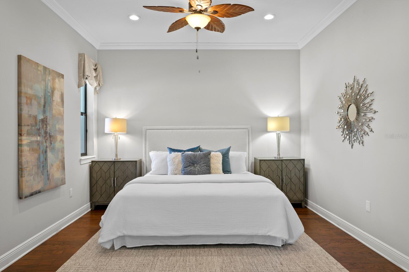 Primary Bedroom on the First floor that leads out to the lanai.