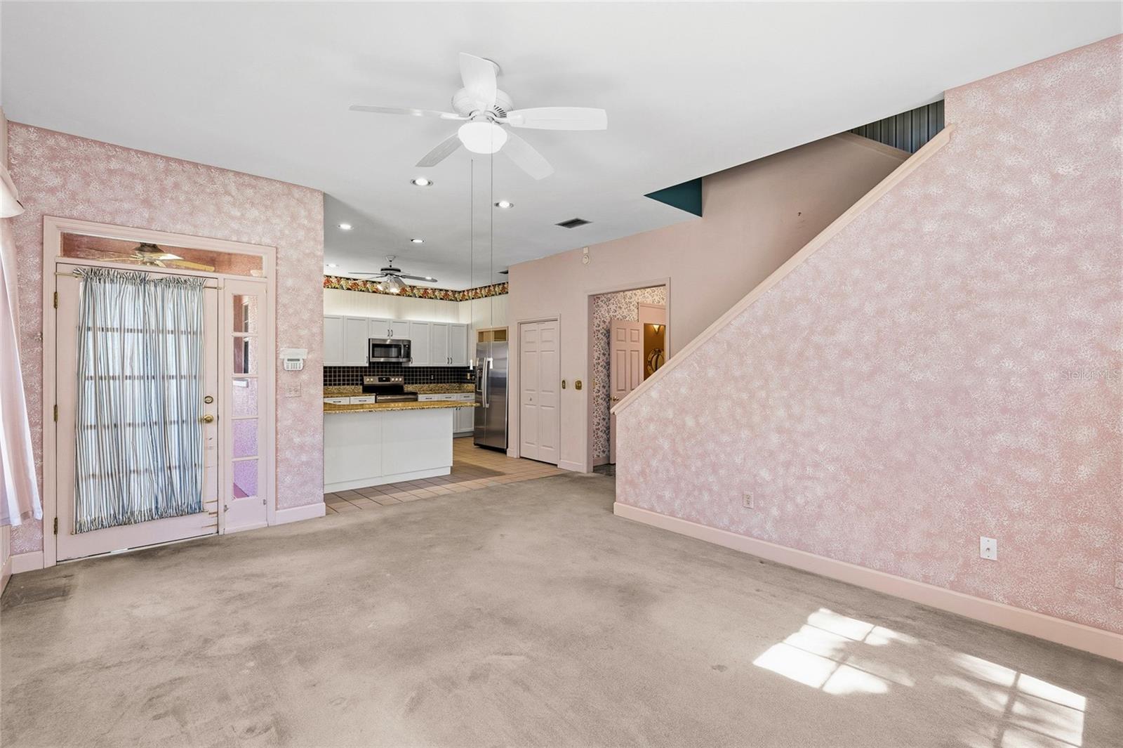 This door takes you to the back screened in porch