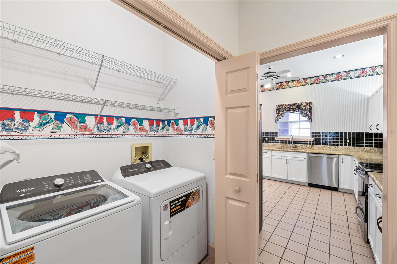 The laundry closet is located across the wet bar