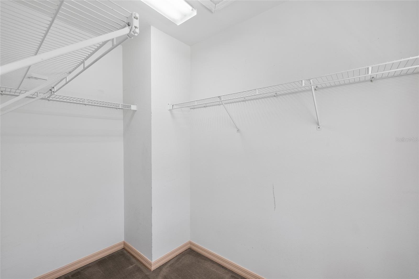 Walk in closet in 3rd bedroom