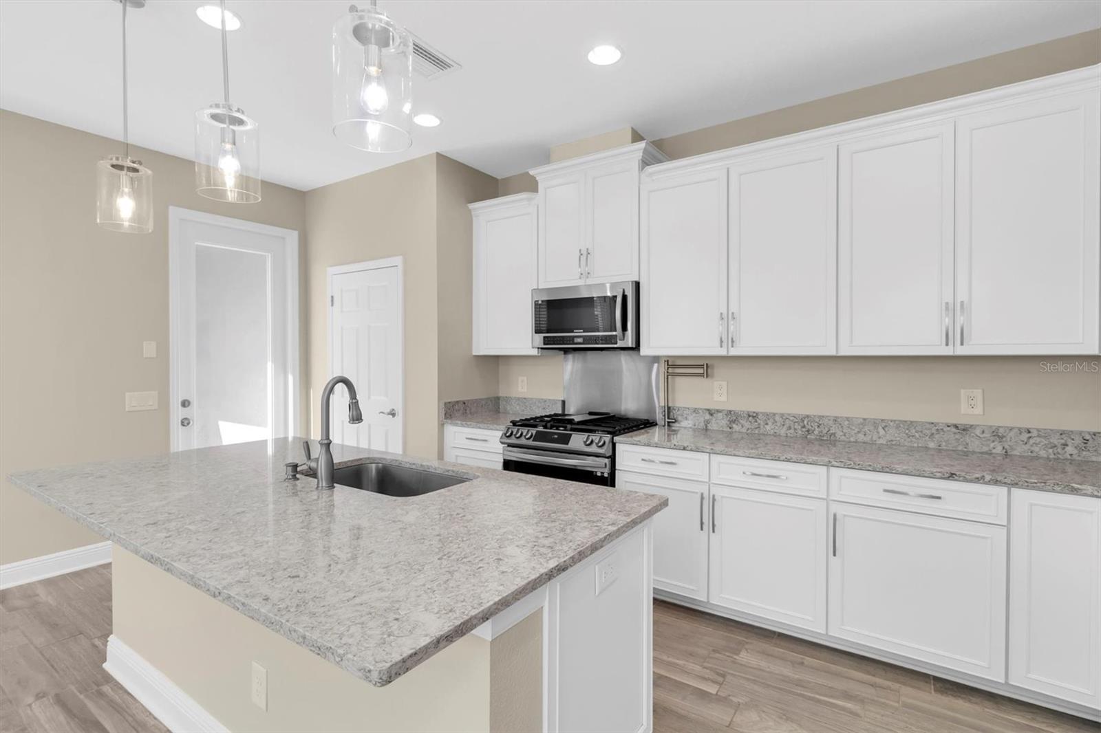 KITCHEN WITH QUARTZ COUNTERS