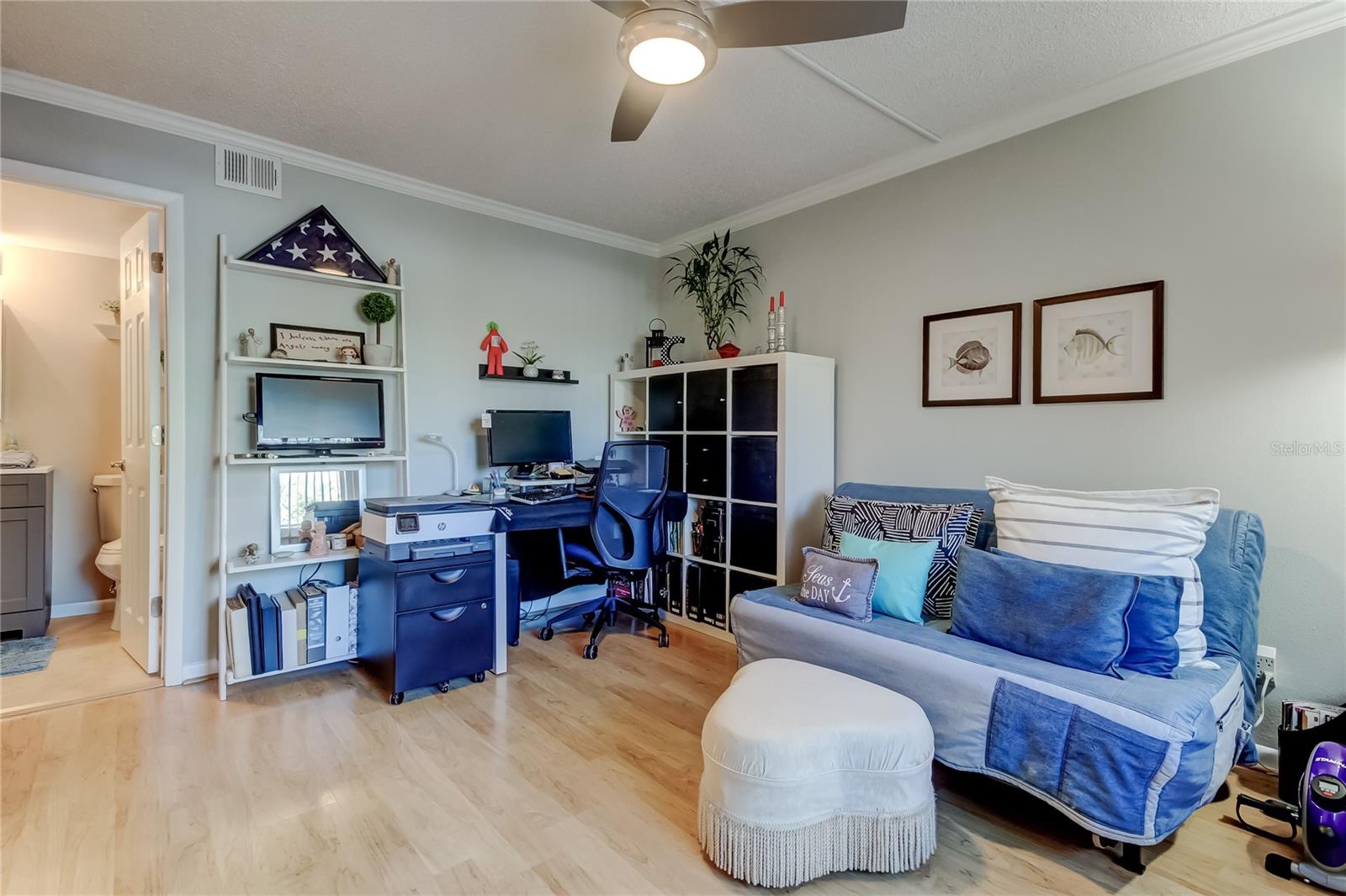Bedroom 2 leads into Jack and Jill Bathroom which has new vanity, tub/shower with new sliding glass door.