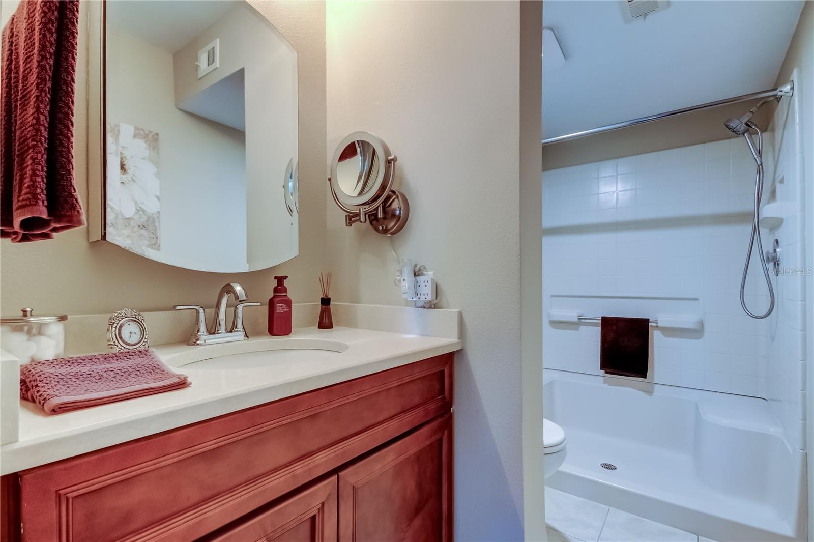 En-suite Master Bath has shower with shower seat.