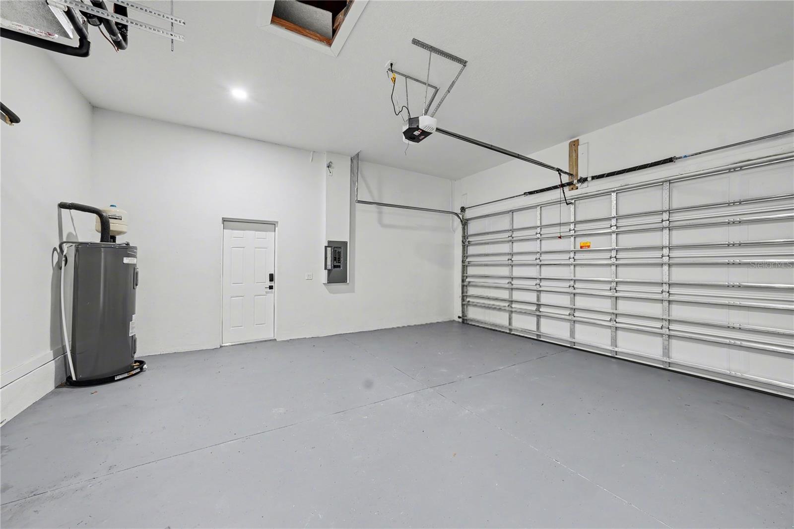 GARAGE W/High Ceiling and 8 foot tall overhead door
