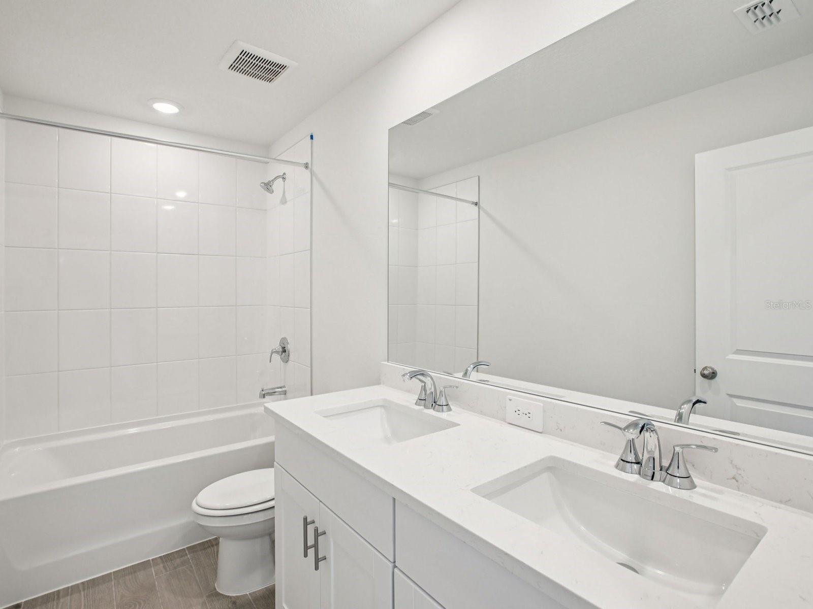 Interior photos are not of the actual home but are photos of the builder home with the same floorplan with similar interior finishes and features.