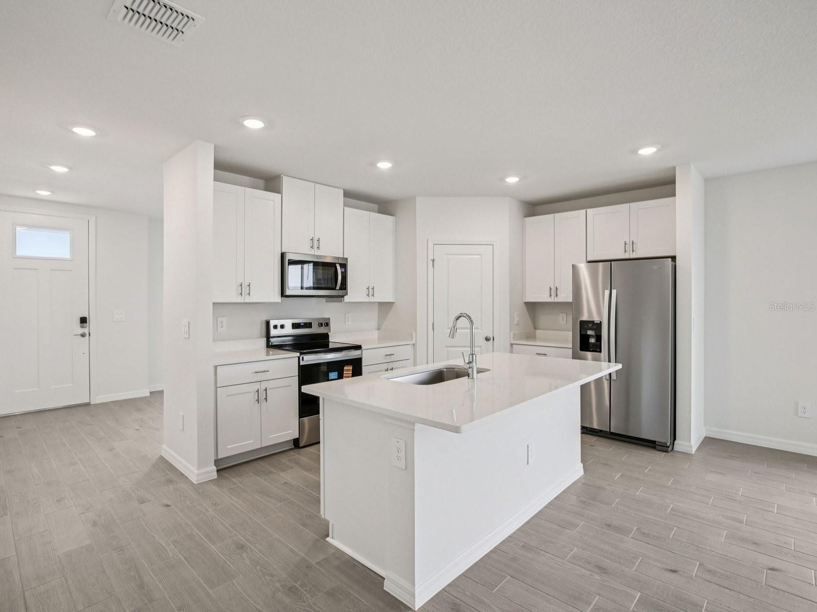 Interior photos are not of the actual home but are photos of the builder home with the same floorplan with similar interior finishes and features.