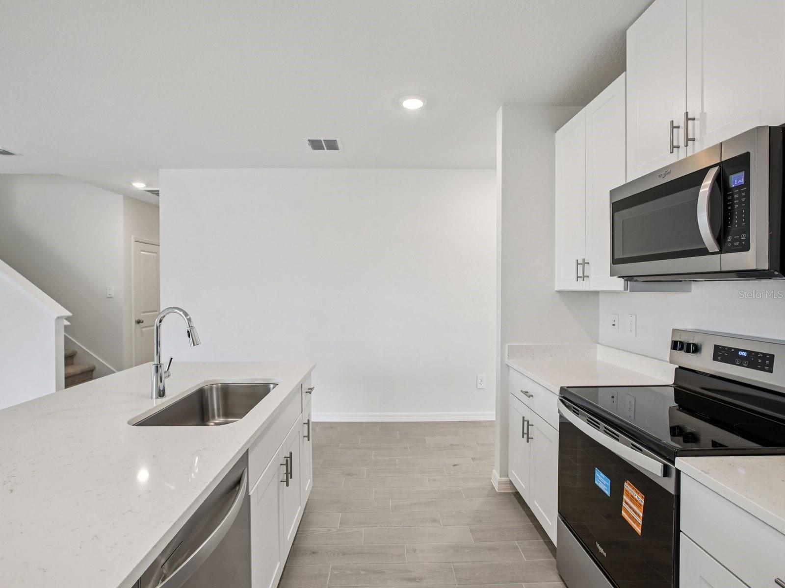 Interior photos are not of the actual home but are photos of the builder home with the same floorplan with similar interior finishes and features.