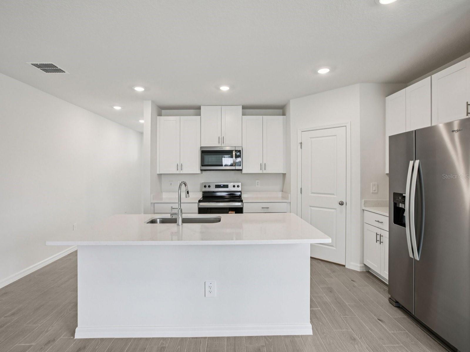 Interior photos are not of the actual home but are photos of the builder home with the same floorplan with similar interior finishes and features.