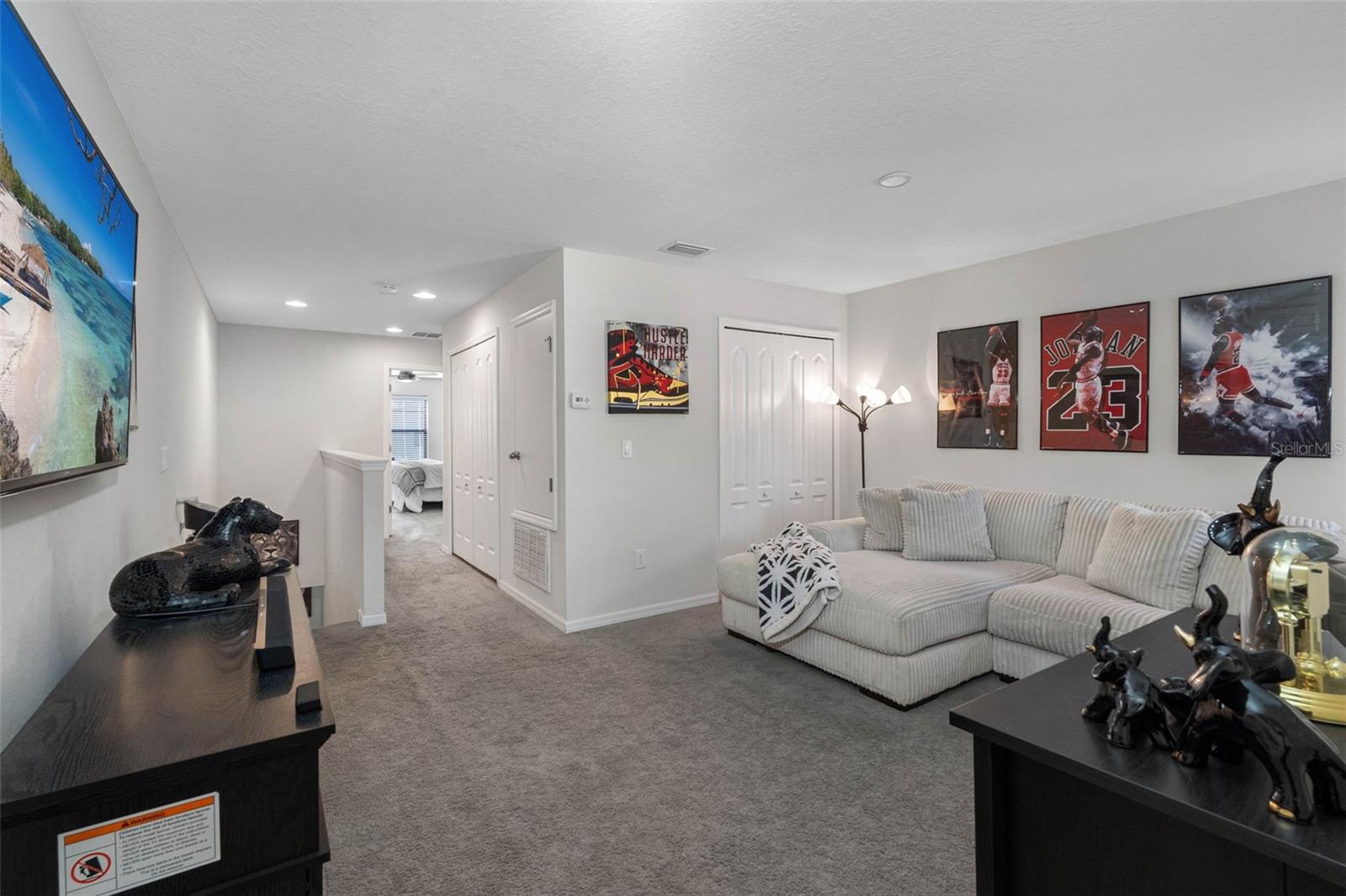 Versatile loft space ideal for a home office, second living area, or third sleeping space with a pull-out sofa.