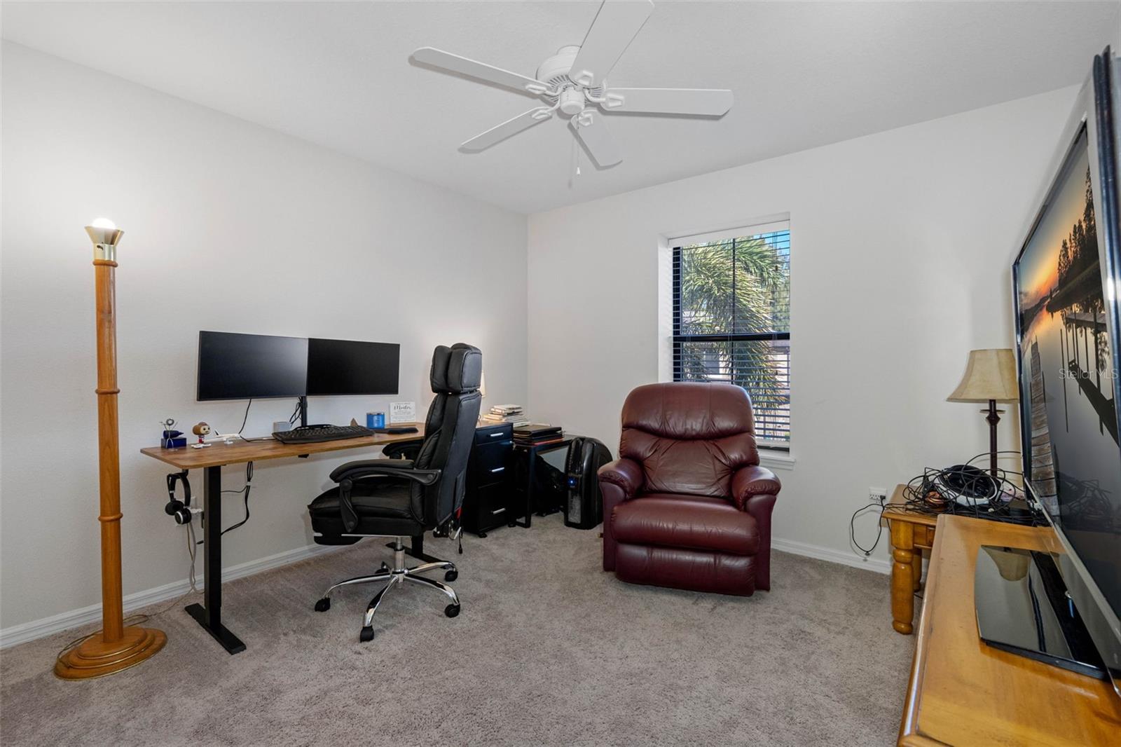 Well-sized second bedroom with easy access to the hallway full bath.