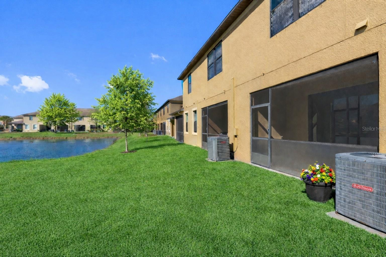 Peaceful pond view providing a relaxing backdrop and added privacy.