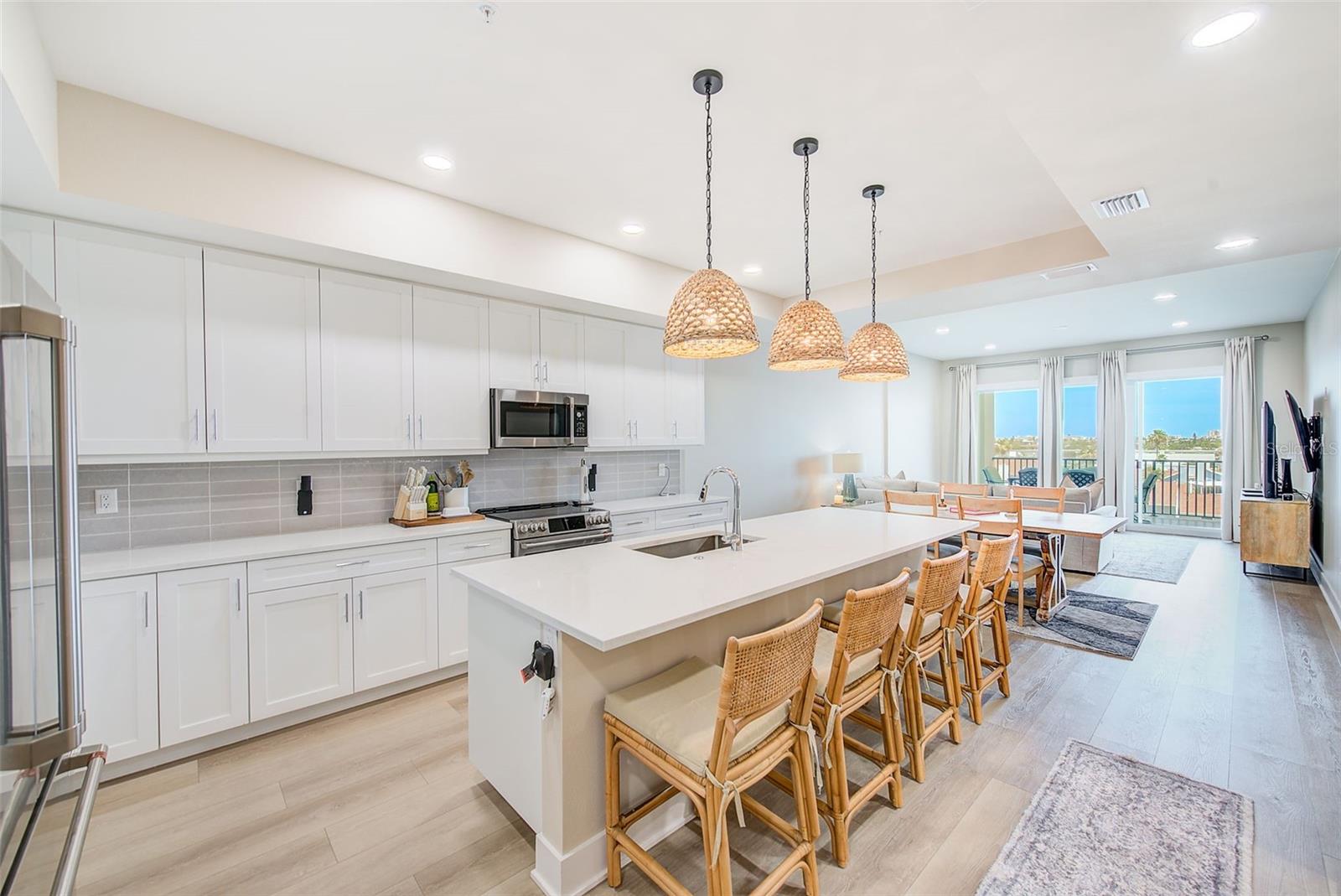 Extra large island with beautiful pendant lighting.