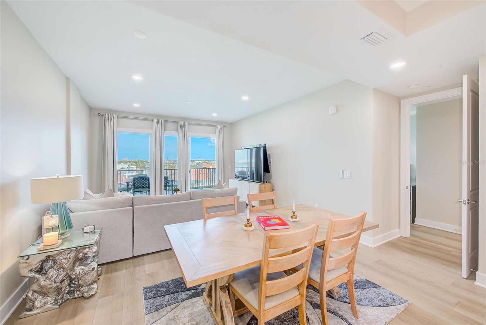 Luxury vinyl plank flooring throughout.