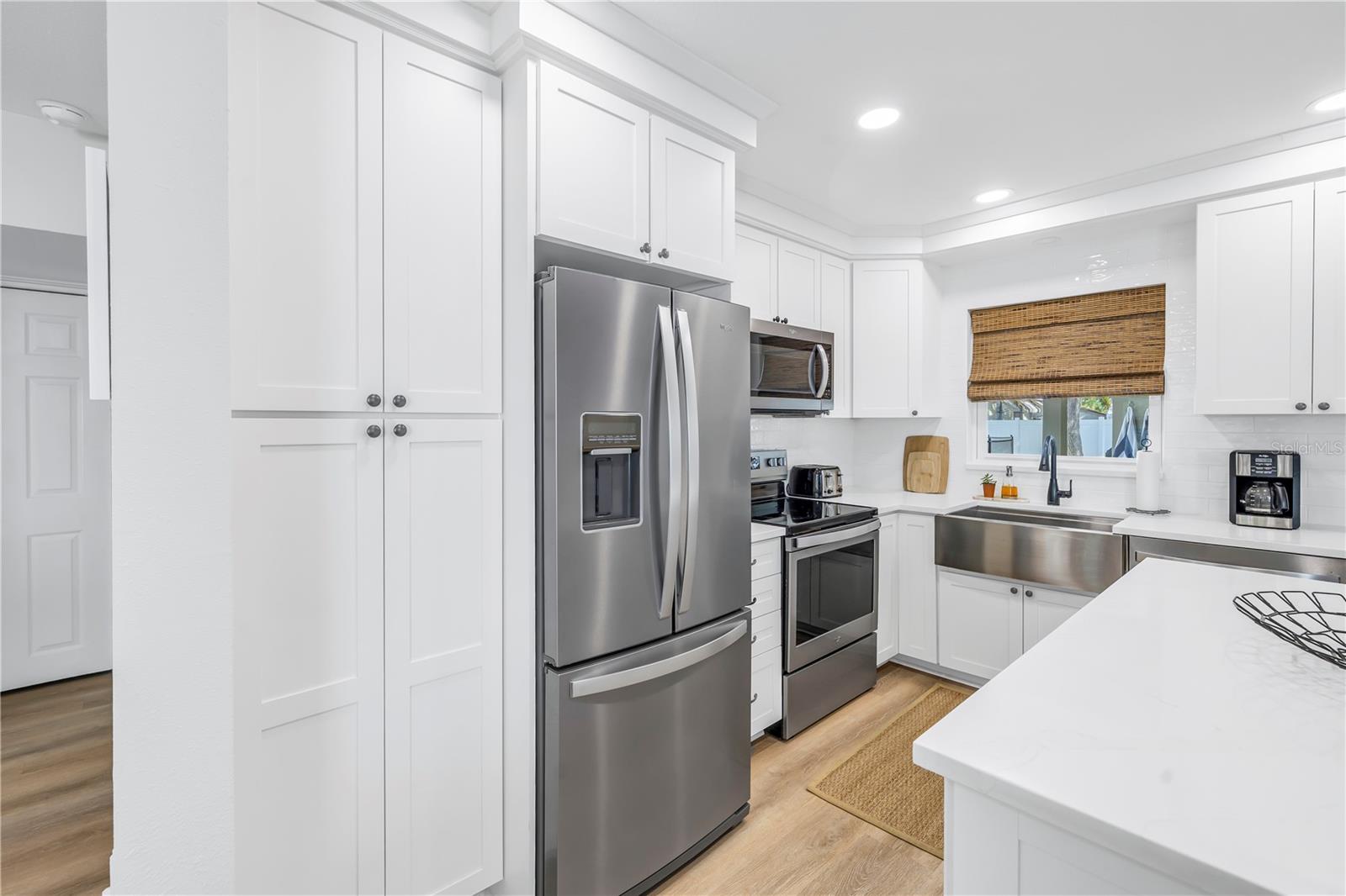 Kitchen w/ built-in pantry
