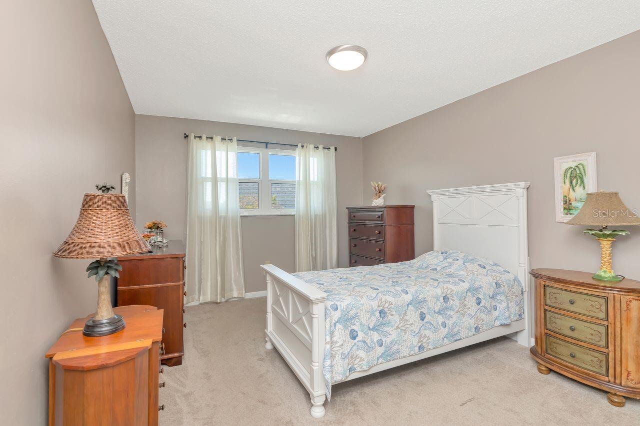 Bedroom with walk in closet