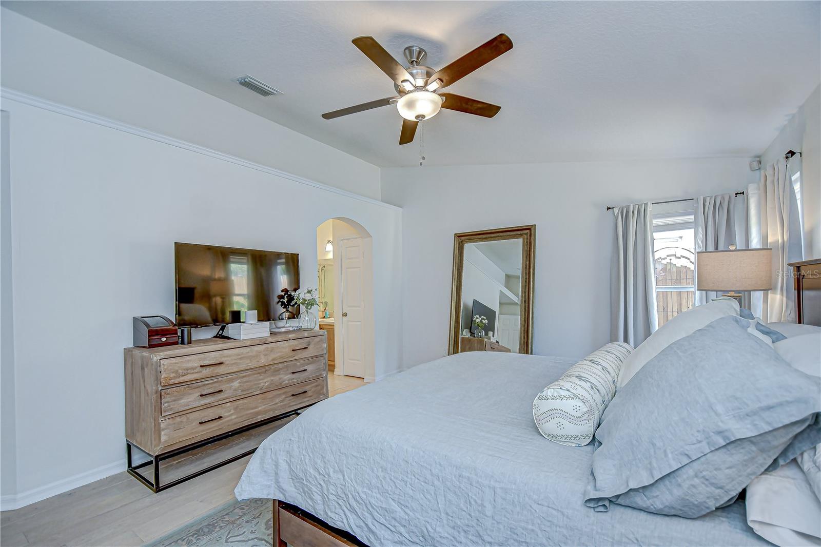 Large layout bedroom with walk-in closet.