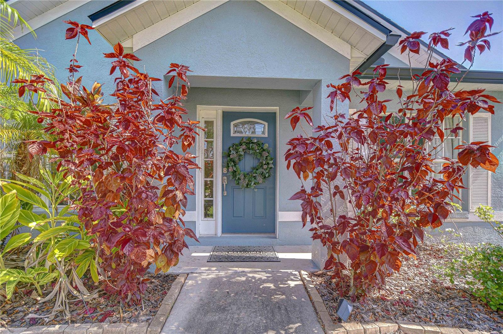 Welcoming front entry with inviting curb appeal.