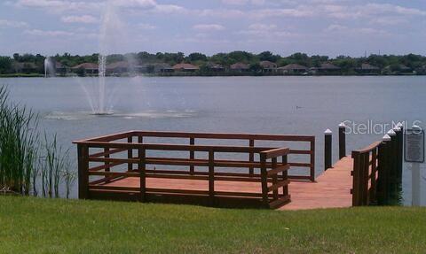 Peaceful fishing pier overlooking the lake.