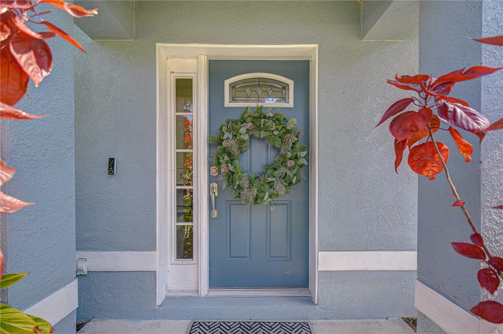 Welcoming front entry with inviting curb appeal.
