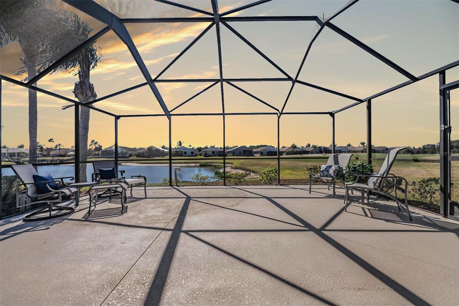 Screened in lanai with pond and golf views