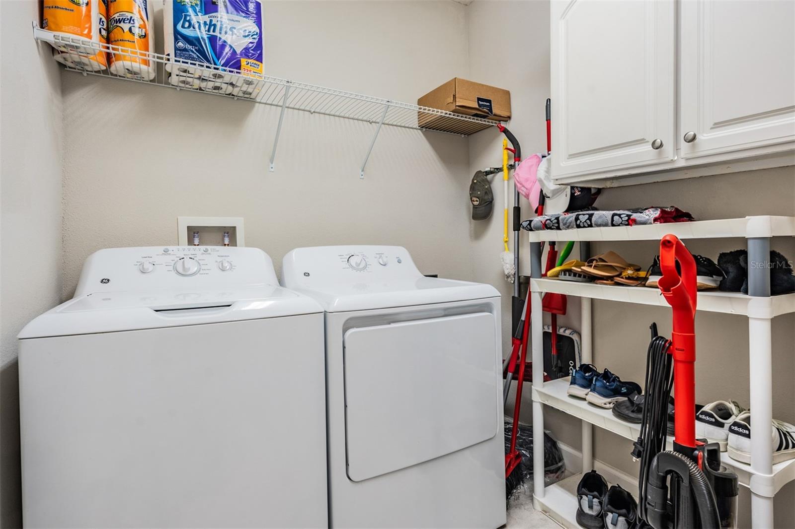 Interior laundry room with extra storage