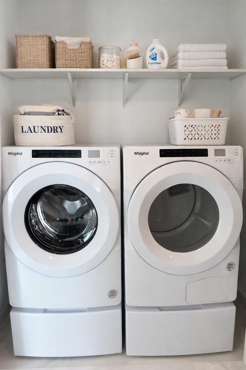 Laundry Closet with Washer & Dryer Including Pedestals - Virtually Staged