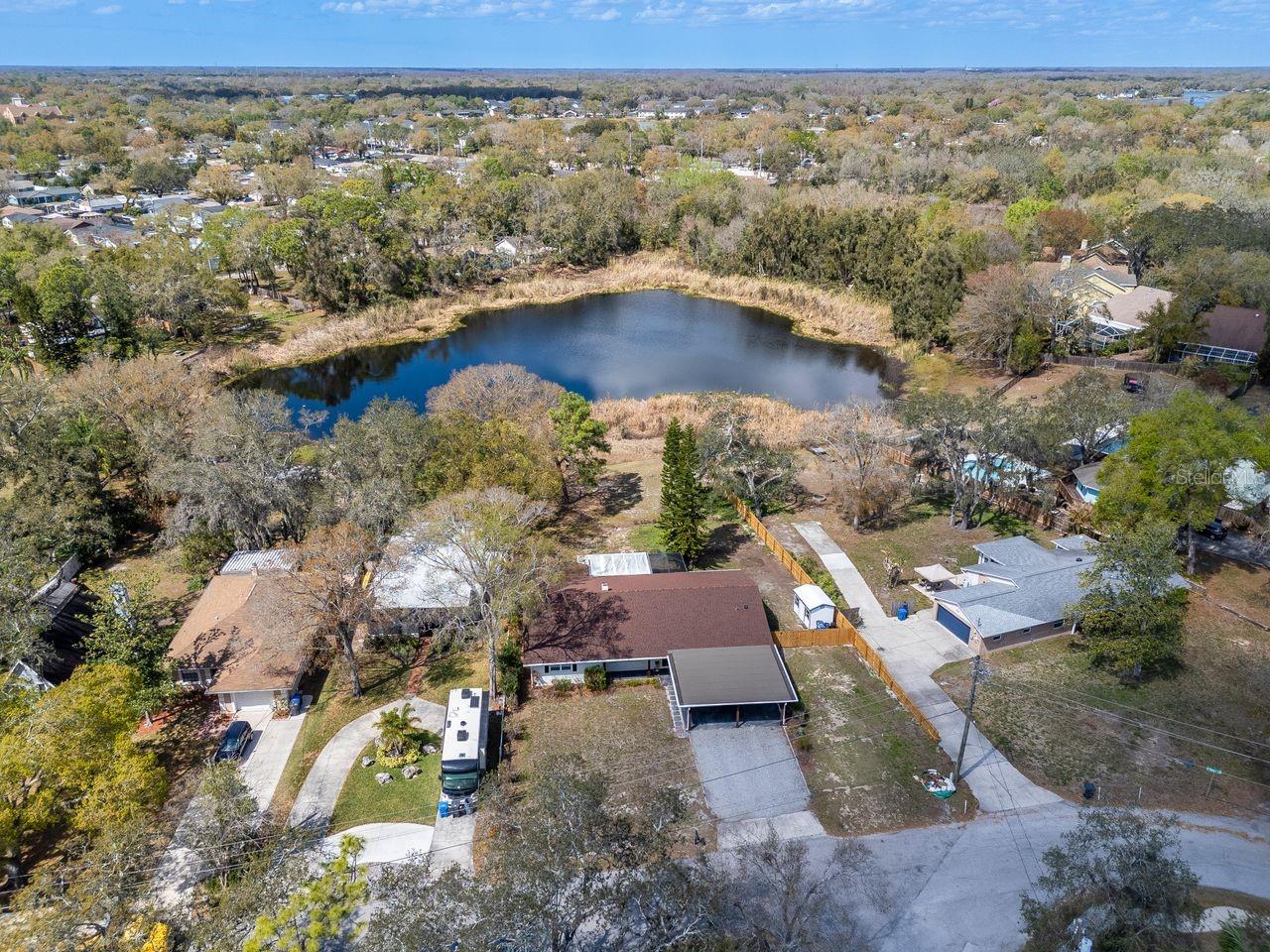 Aerial View of Home and Pond