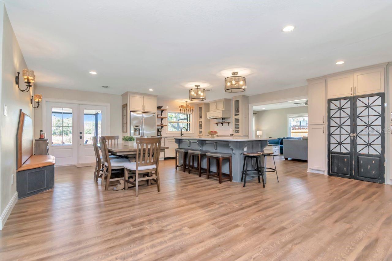 Dining, Kitchen, and Decorative Doors to Pantry