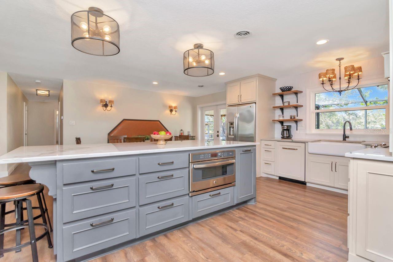 Kitchen, Island, Sink and  Window Overlooking Backyard & Pond