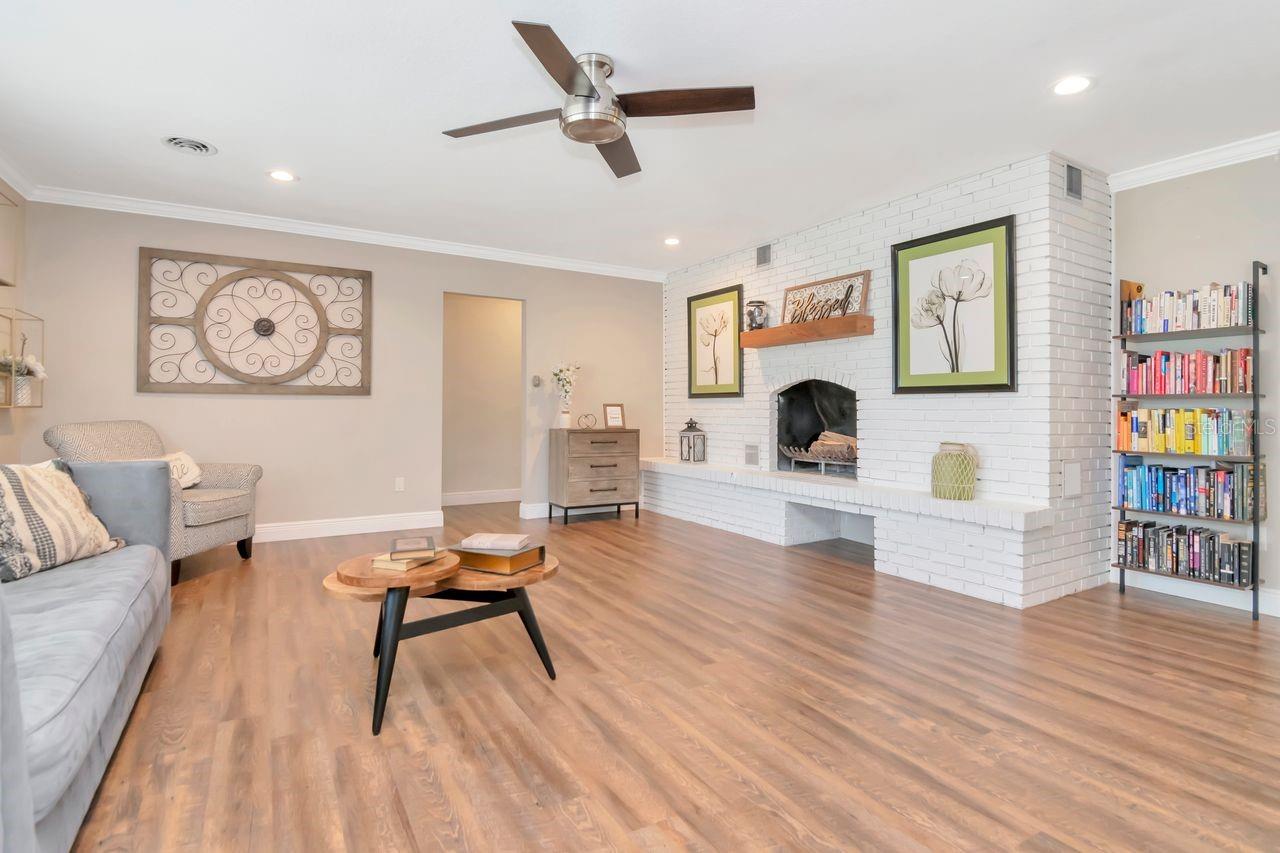 Living Room, Wood Burning Fireplace, and Entry to Bedrooms