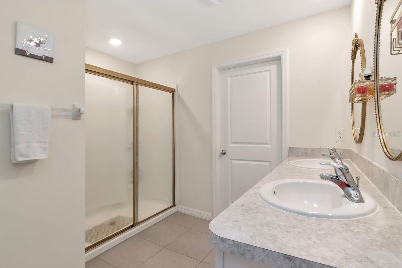 Primary Ensuite with Dual Vanity and Walk in Shower, and private water closet