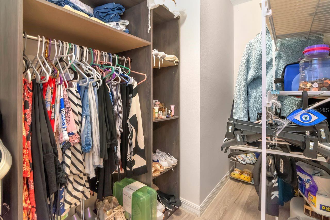 Primary Closet with custom shelving